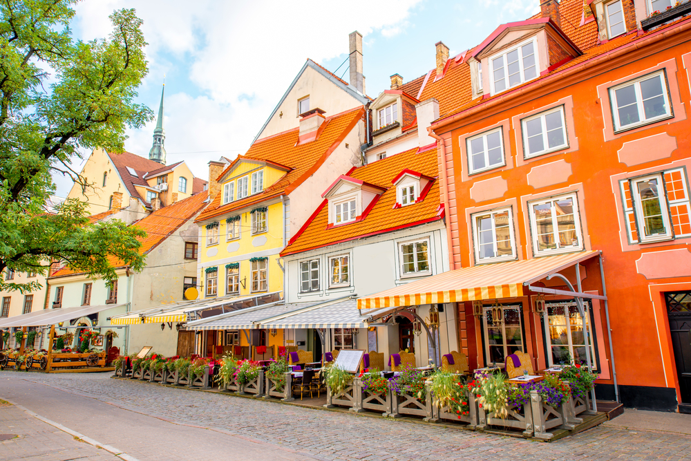 teach in latvia and visit villages with small sidewalk cafes