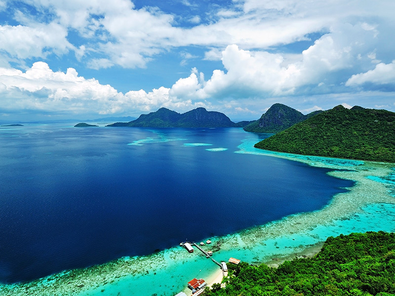 view of bright blue and turquoise malaysia coastline
