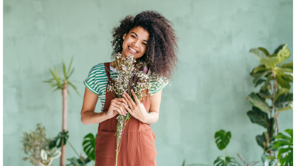 happy teacher feeling valued during onboarding process after teacher recruitment